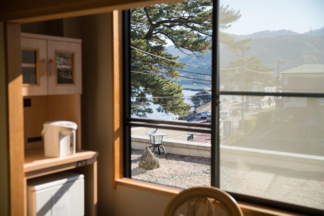 New Tomiyoshi Hotel อาตามิ ภายนอก รูปภาพ