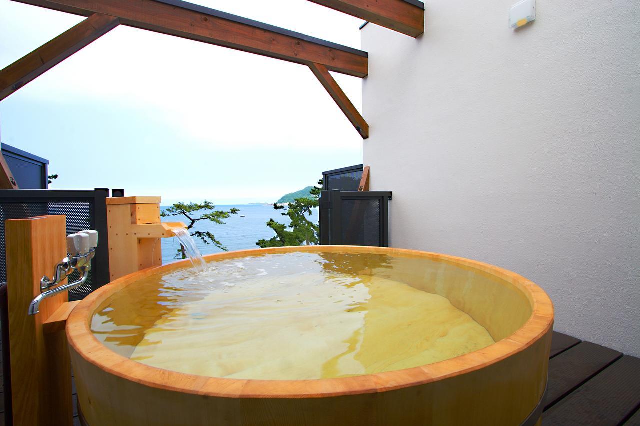 New Tomiyoshi Hotel อาตามิ ภายนอก รูปภาพ