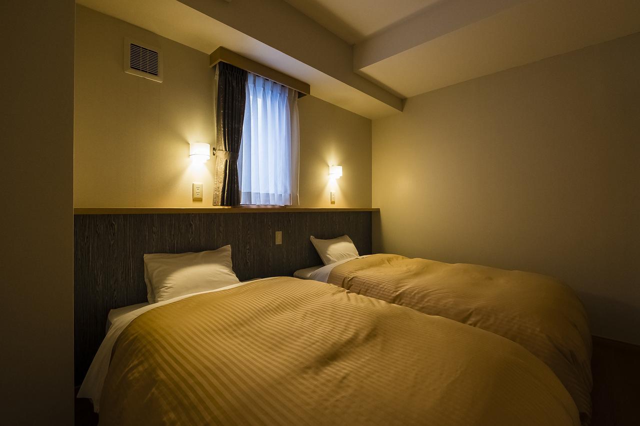 New Tomiyoshi Hotel อาตามิ ภายนอก รูปภาพ